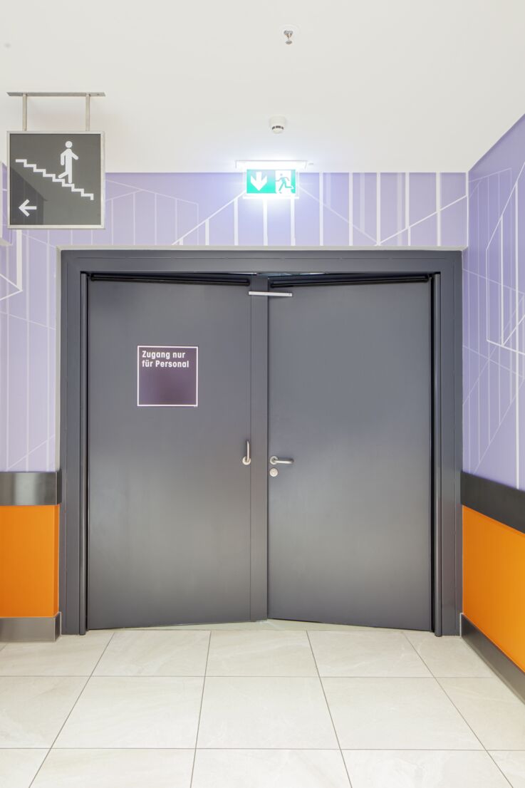 Double-leaf swing door in fire safety design, closed.