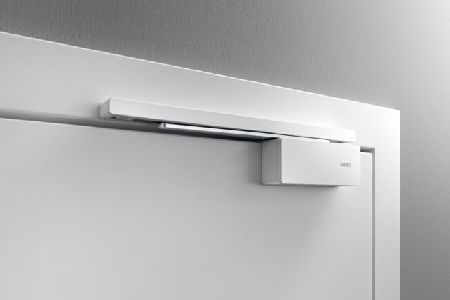 GEZE ActiveStop surface-mounted on a timber door Gentle stopping, quiet closing and comfortable holding open of doors
Practically eliminates issues like slamming doors, trapped fingers and damage to walls or furniture.